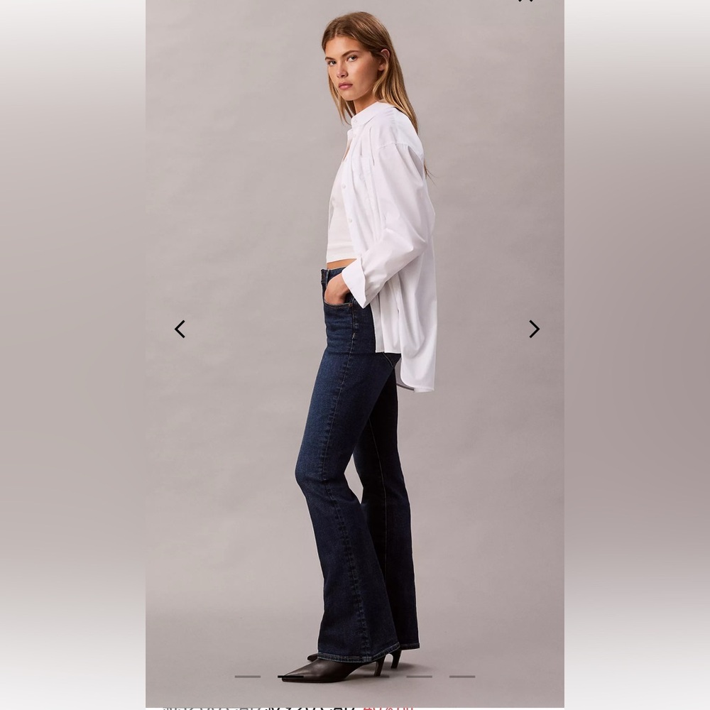 Calvin Klein High Rise Flared Jeans - Picture 3 of 7